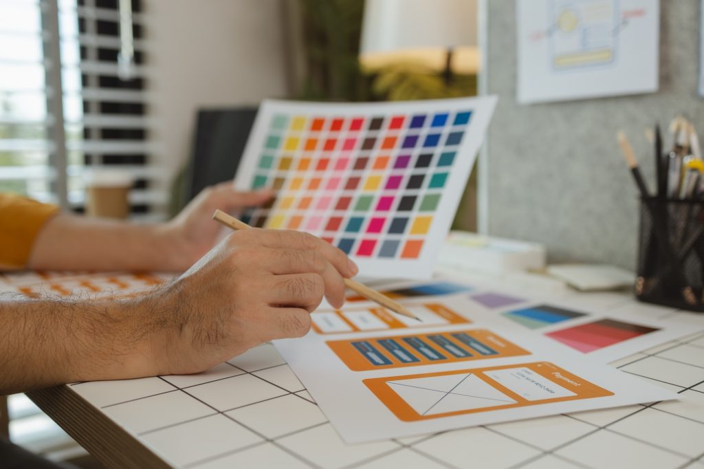 A web designer is using his idea to create a digital product design project that will meet the needs